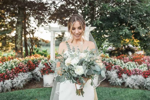 bride holding flowers